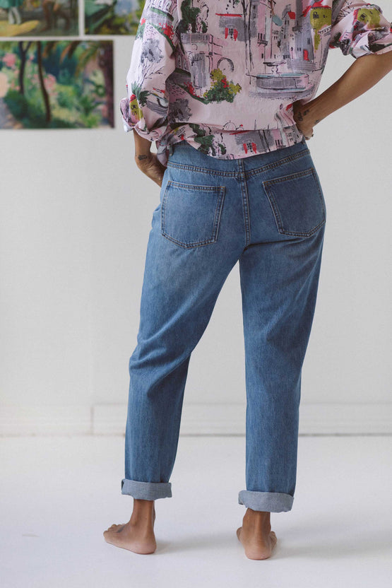 Organic cotton washed denim jeans - back angle with two back pockets