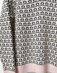 Patterned jumper - black and white loops with pale pink edges