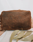 Damien and Yilpi Marks Embossed Leather Toiletry Bag - Brown